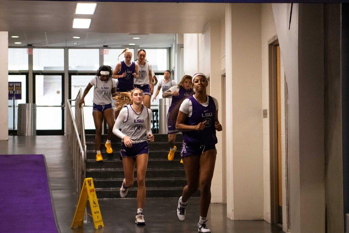 LSU women&#8217;s basketball junior forward Angel Reese (10) runs out with the team on Monday, Sept. 25, 2023, at the women&#8217;s basketball open practice in the Pete Maravich Assembly Center in Baton Rouge, La.