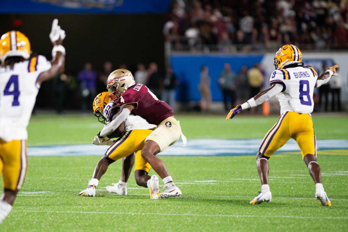 LSU football junior cornerback Duce Chestnut (22) intercepts the ball on Sunday, Sept. 3, 2023, during LSU&#8217;s 45-24 loss to Florida State at Camping World Stadium in Orlando, Fl.