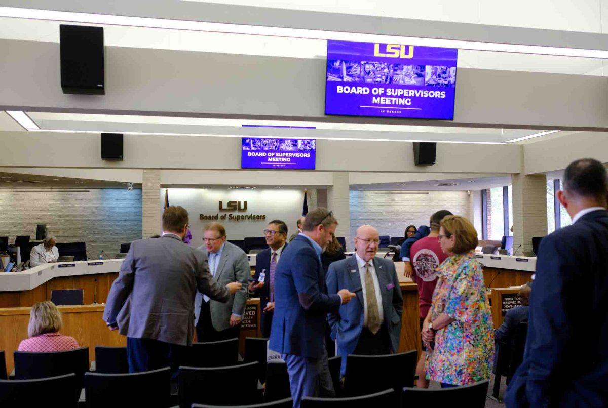 Board of Supervisors members and attendees disperse as the meeting comes to a close at the Administration Building on LSU's campus in Baton Rouge, La: Sept. 8, 2023.