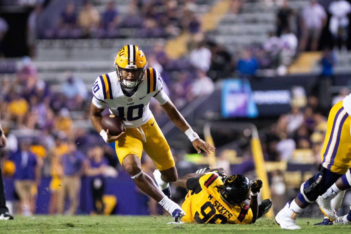 LSU football freshman quarterback Rickie Collins (10) runs with the ball on Saturday, Sept. 9, 2023, during LSU&#8217;s 72-10 win over Grambling State at Tiger Stadium in Baton Rouge, La.