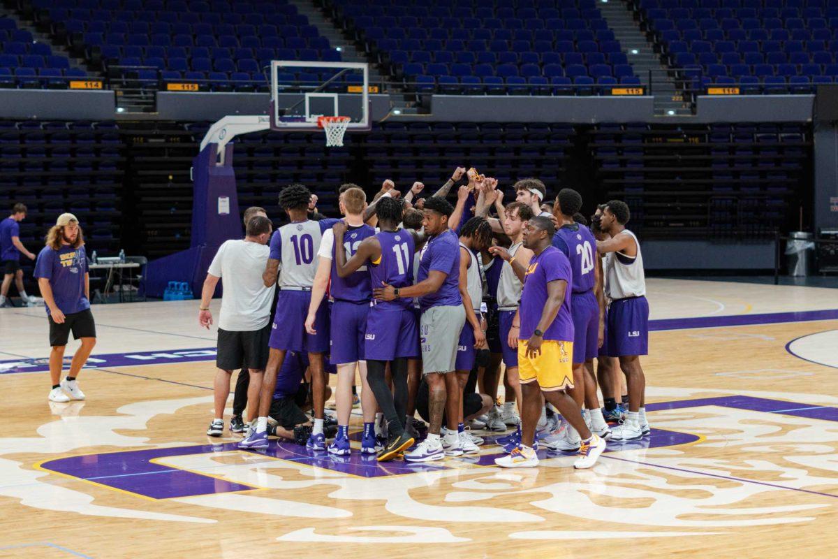 The LSU men's basketball team huddles up on Tuesday, Sept. 26, 2023, during their first practice at the Pete Maravich Assembly Center in Baton Rouge, La.