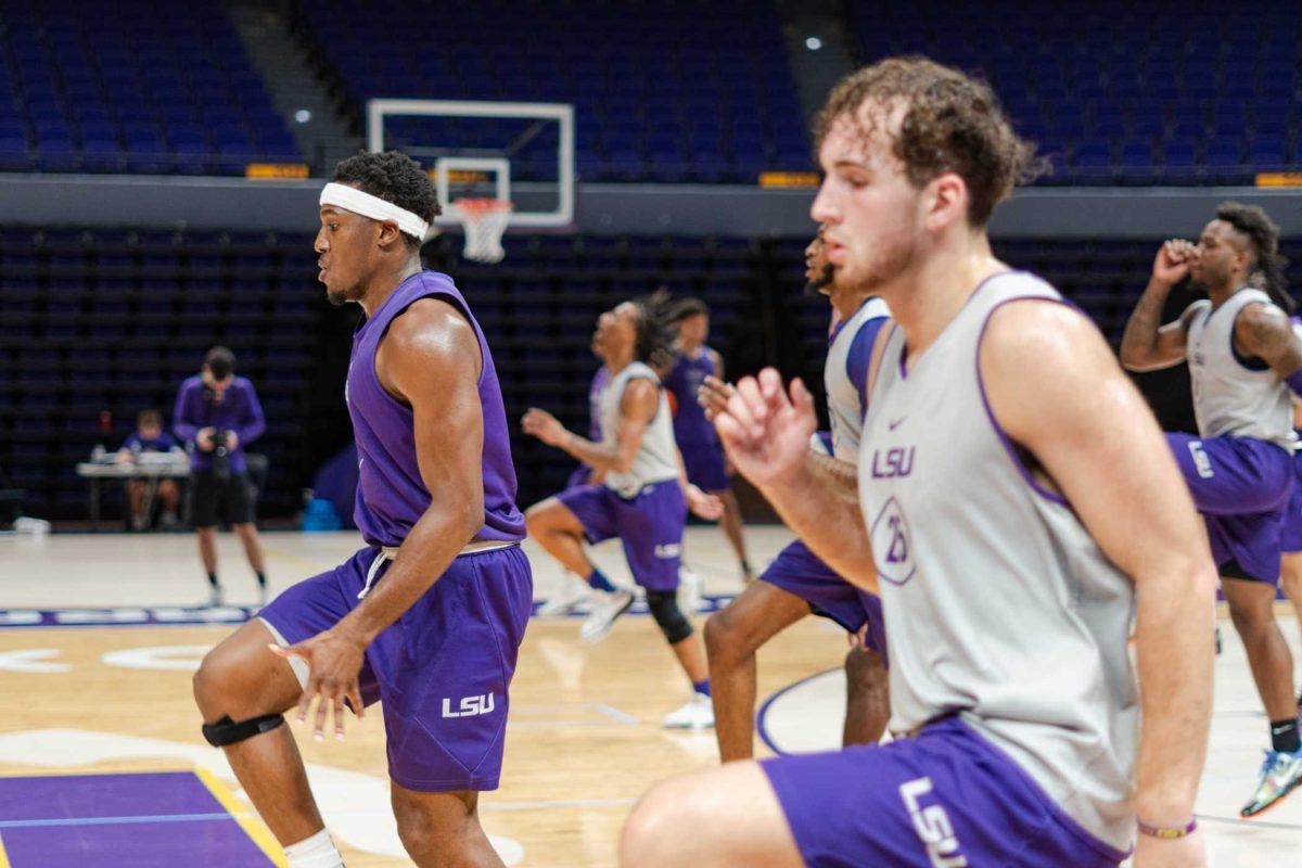 The LSU men's basketball team warms up on Tuesday, Sept. 26, 2023, during their first practice at the Pete Maravich Assembly Center in Baton Rouge, La.