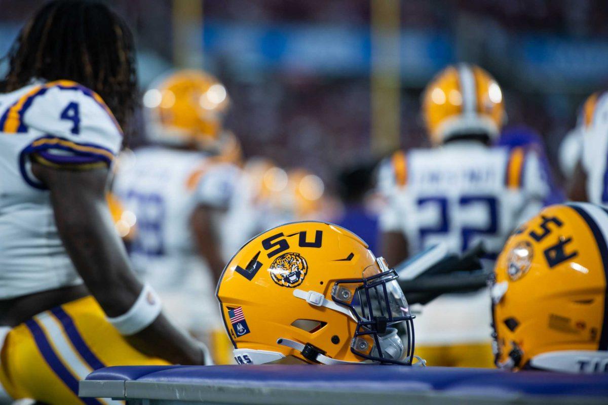 An LSU football helmet sits on the side on Sunday, Sept. 3, 2023, during LSU&#8217;s 45-24 loss to Florida State at Camping World Stadium in Orlando, Fl.