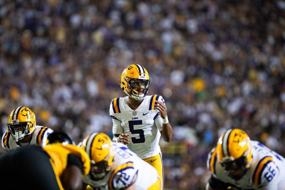 LSU football senior quarterback Jayden Daniels (5) prepares to take a snap on Saturday, Sept. 9, 2023, during LSU&#8217;s 72-10 win over Grambling State at Tiger Stadium in Baton Rouge, La.