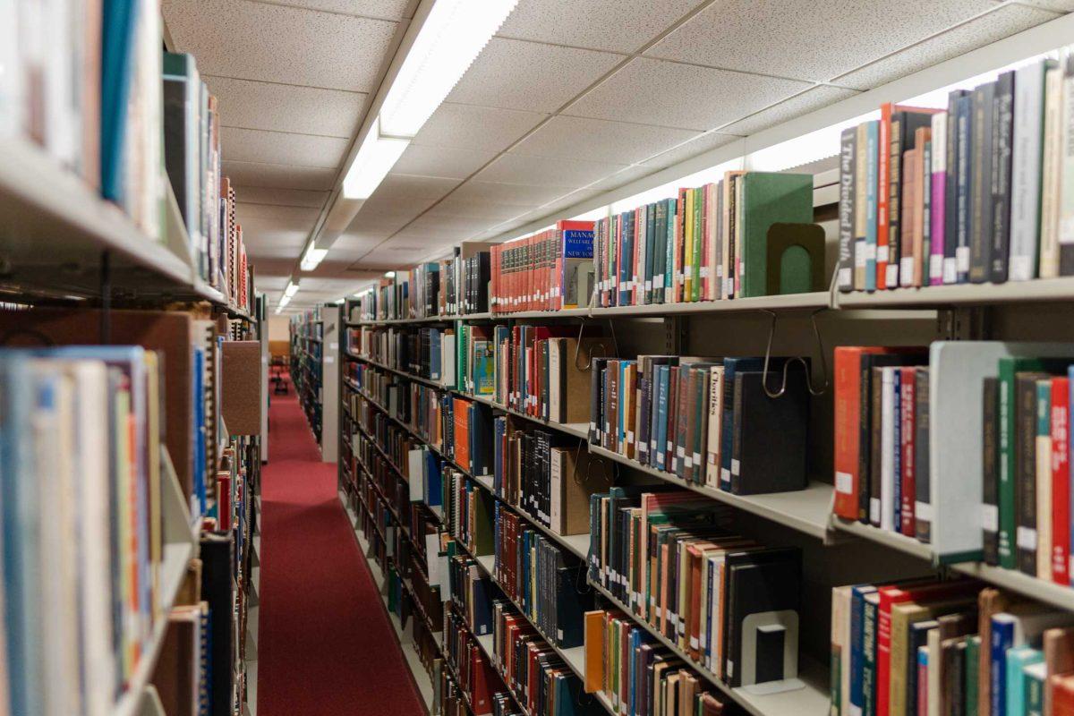 Books fill the shelves on Thursday, April 13, 2023, inside the LSU Library on LSU&#8217;s campus in Baton Rouge, La.