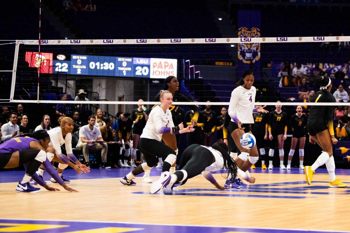 LSU volleyball freshman outside hitter Jurnee Robinson (5) dives for the ball on Friday, Sept. 29, 2023, during LSU&#8217;s 3-1 win against Missouri in the Pete Maravich Assembly Center in Baton Rouge, La.