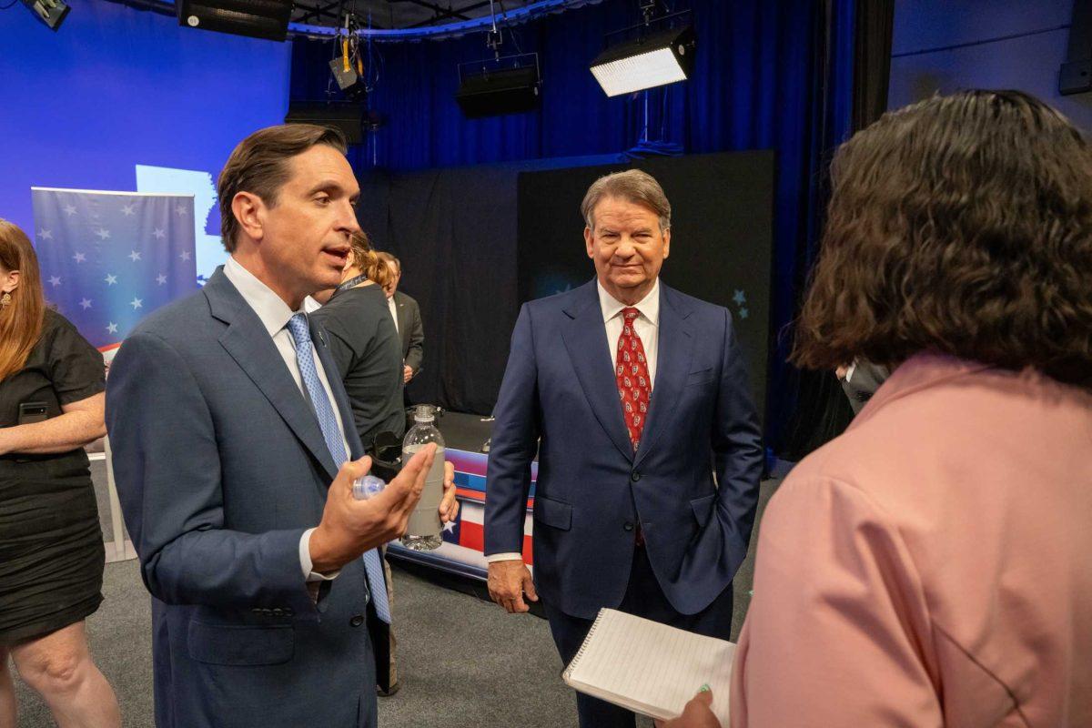 Louisiana governor's candidates Stephen Waguespack and Hunter Lundy speak to a reporter Thursday, Sep. 29, 2023 at the Public Broadcasting Studio on Perkins Road in Baton Rouge, La.