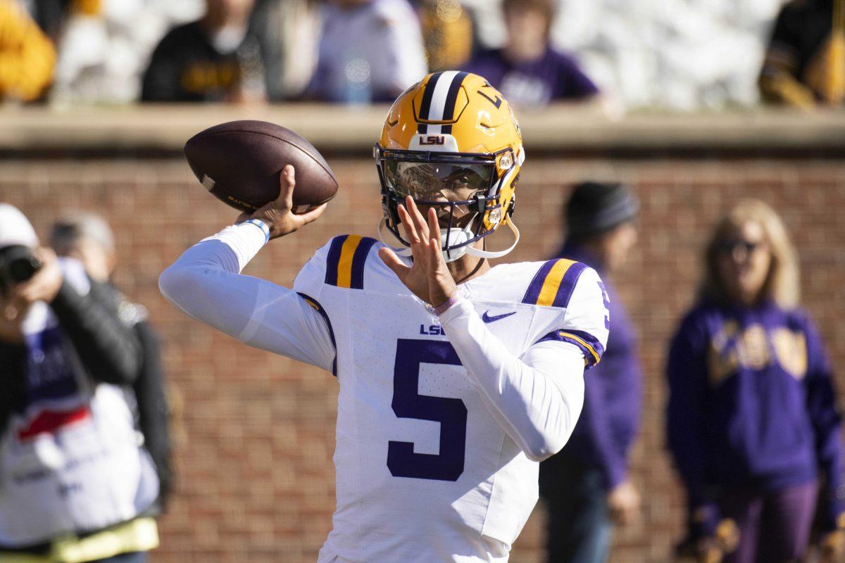 <p>LSU quarterback Jayden Daniels warms up before the start of an NCAA college football game against Missouri Saturday, Oct. 7, 2023, in Columbia, Mo. (AP Photo/L.G. Patterson)</p>