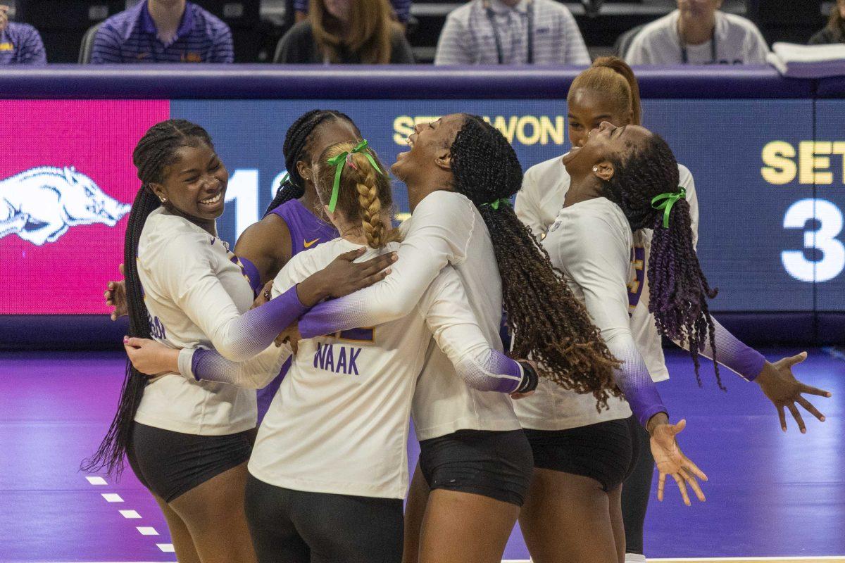 The LSU volleyball celebrates a point Wednesday, Oct. 4, 2023, during LSU's 3-0 loss to Arkansas at the Pete Maravich Assembly Center in Baton Rouge, La.