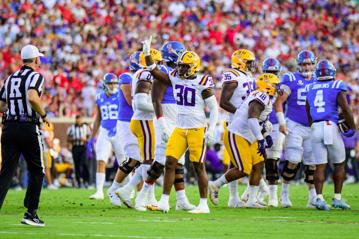 LSU football junior linebacker Greg Penn III (30) celebrates a stop on Saturday, Sept. 30, 2023, during LSU's 55-49 loss against Ole Miss in Vaught-Hemingway Stadium in Oxford, Miss.