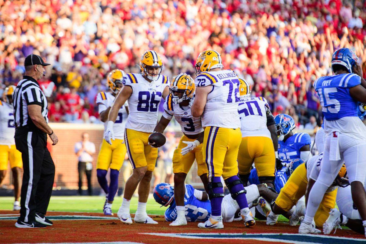 LSU football junior running back Logan Diggs (3) celebrates a touchdown on Saturday, Sept. 30, 2023, during LSU's 55-49 loss against Ole Miss in Vaught-Hemingway Stadium in Oxford, Miss.