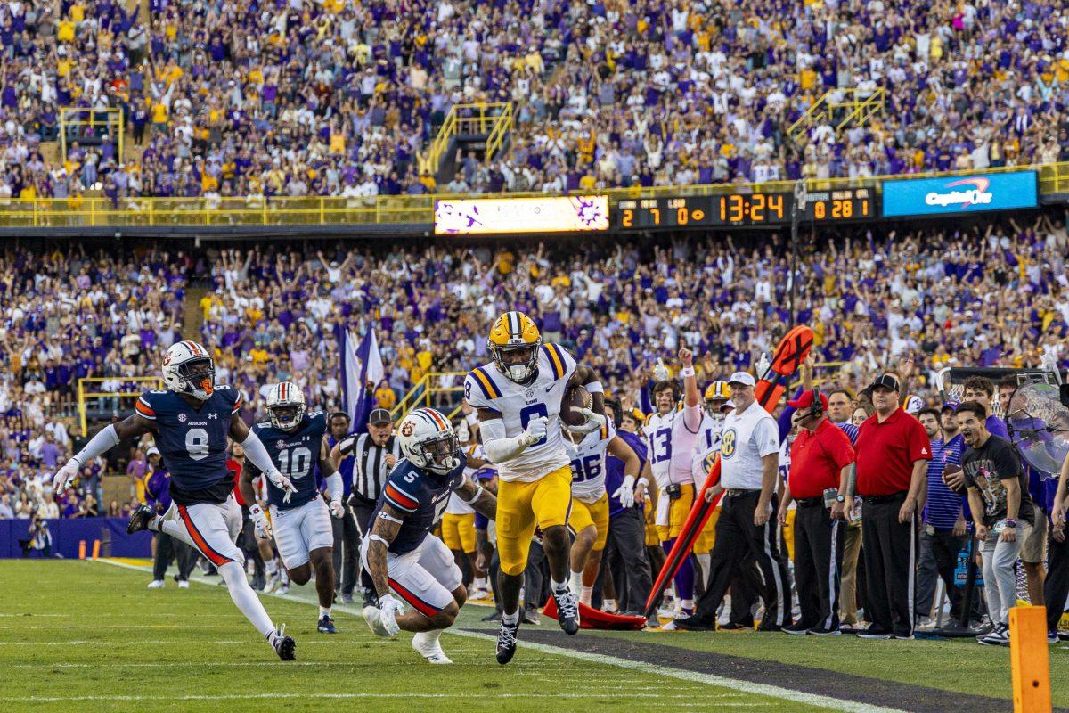 LSU football junior wide receiver Malik Nabors (8) streaks down the field Saturday, Oct. 14, 2023, during LSU&#8217;s 48-18 win against Auburn in Tiger Stadium in Baton Rouge, La.