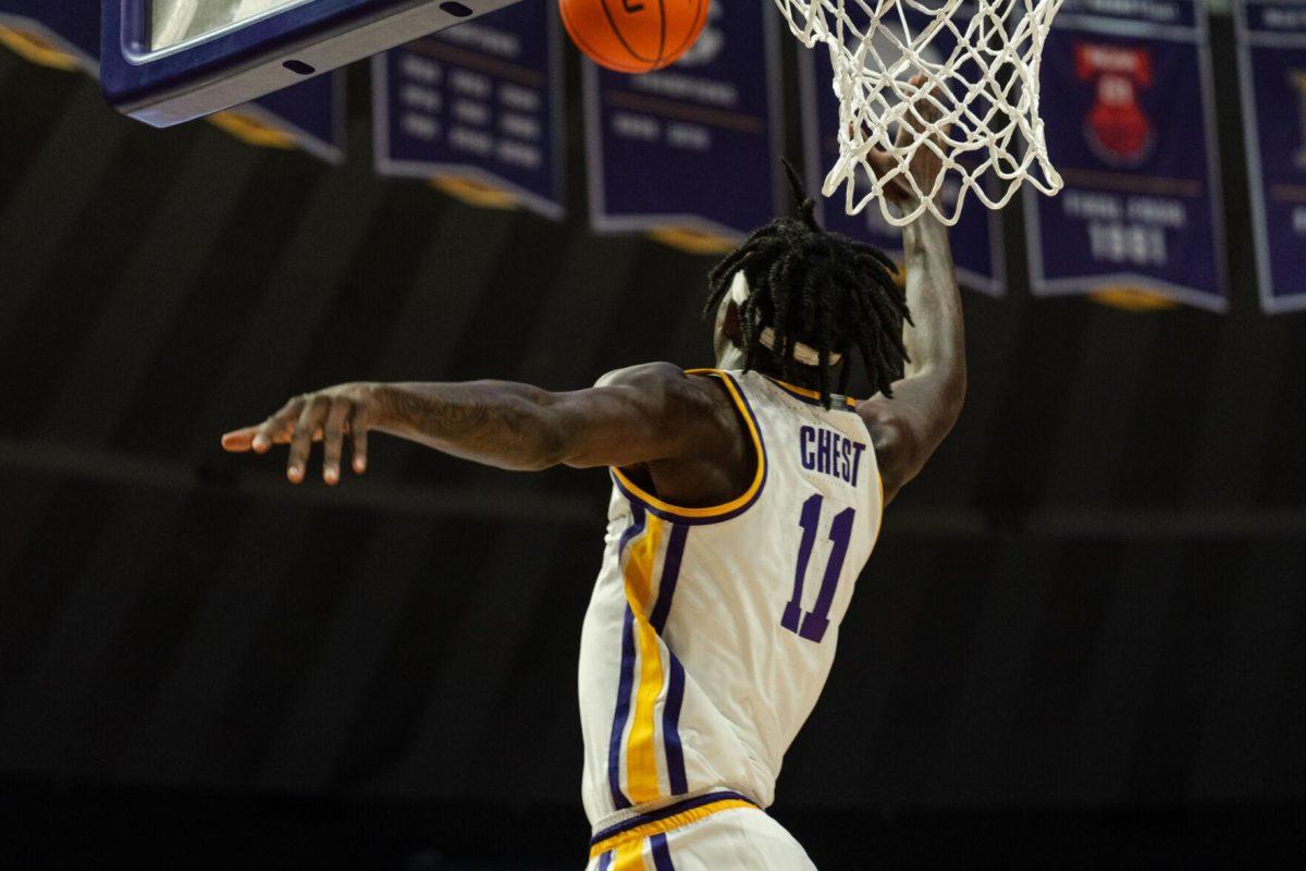 LSU men's basketball freshman forward Corey Chest (11) tries to block the ball Monday, Oct. 30, 2023, during LSU's 132-44 win against Louisiana Christian in the Pete Maravich Assembly Center in Baton Rouge, La.