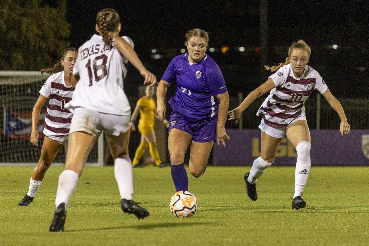 <p>LSU soccer senior forward Mollie Baker pushes through defenders Thursday, Oct. 26, 2023, during LSU's 0-0 draw to Texas A&M at the LSU Soccer Stadium.</p>