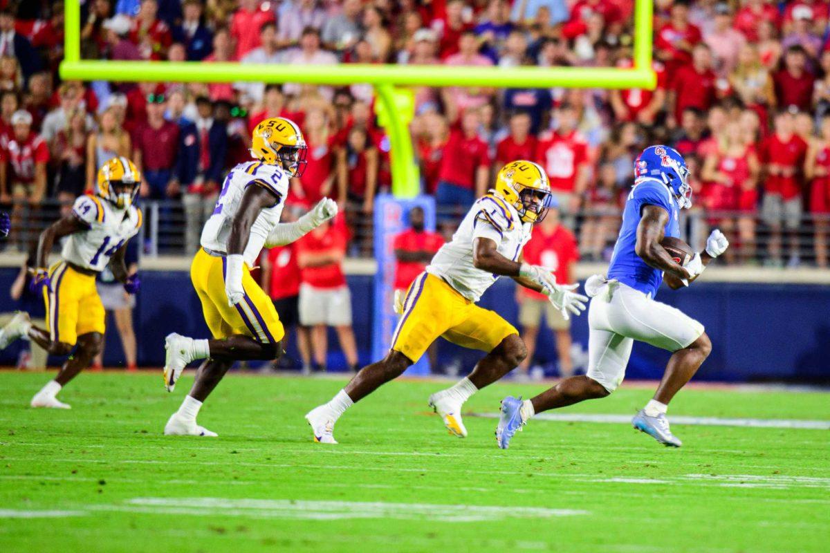 The LSU football defense chases after a player on Saturday, Sept. 30, 2023, during LSU's 55-49 loss against Ole Miss in Vaught-Hemingway Stadium in Oxford, Miss.