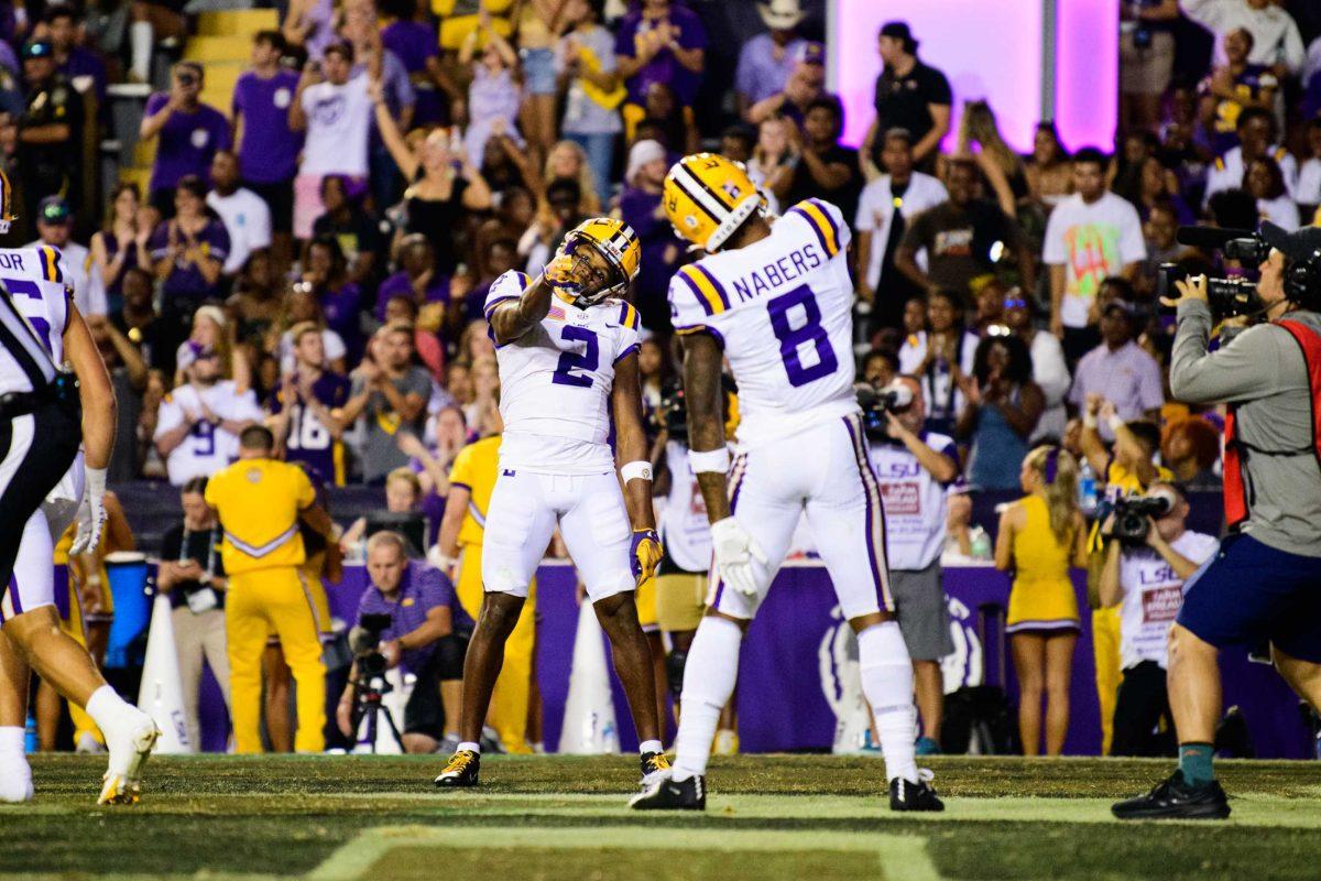 LSU football senior wide receiver Kyren Lacy (2) celebrates a touchdown with LSU football junior wide receiver Malik Nabers (8) on Saturday, Oct. 21, 2023, during LSU's 62-0 victory against Army in Tiger Stadium in Baton Rouge, La.