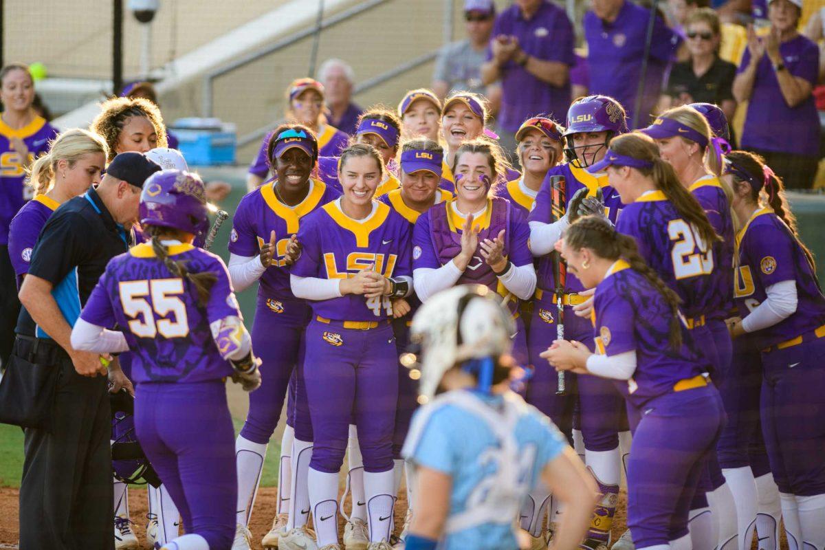 <p>The LSU softball team celebrates LSU softball graduate student utility Raeleen Gutierrez's (55) home run on Friday, Oct. 20, 2023, during LSU's exhibition game against Co-Lin CC in Tiger Park in Baton Rouge, La.</p>