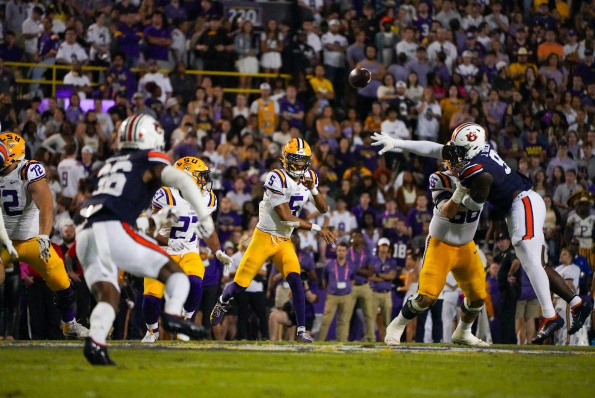 LSU football senior quarterback (5) throws a pass during the 48-18 LSU win vs. Auburn on Saturday, Oct. 14, 2023, at Tiger Stadium in Baton Rouge, La.