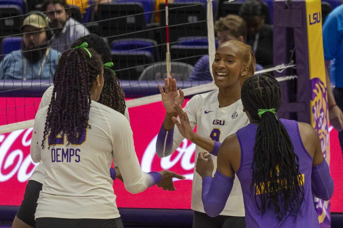 The LSU volleyball team celebrates a point Wednesday, Oct. 4, 2023, during LSU's 3-0 loss to Arkansas at the Pete Maravich Assembly Center in Baton Rouge, La.