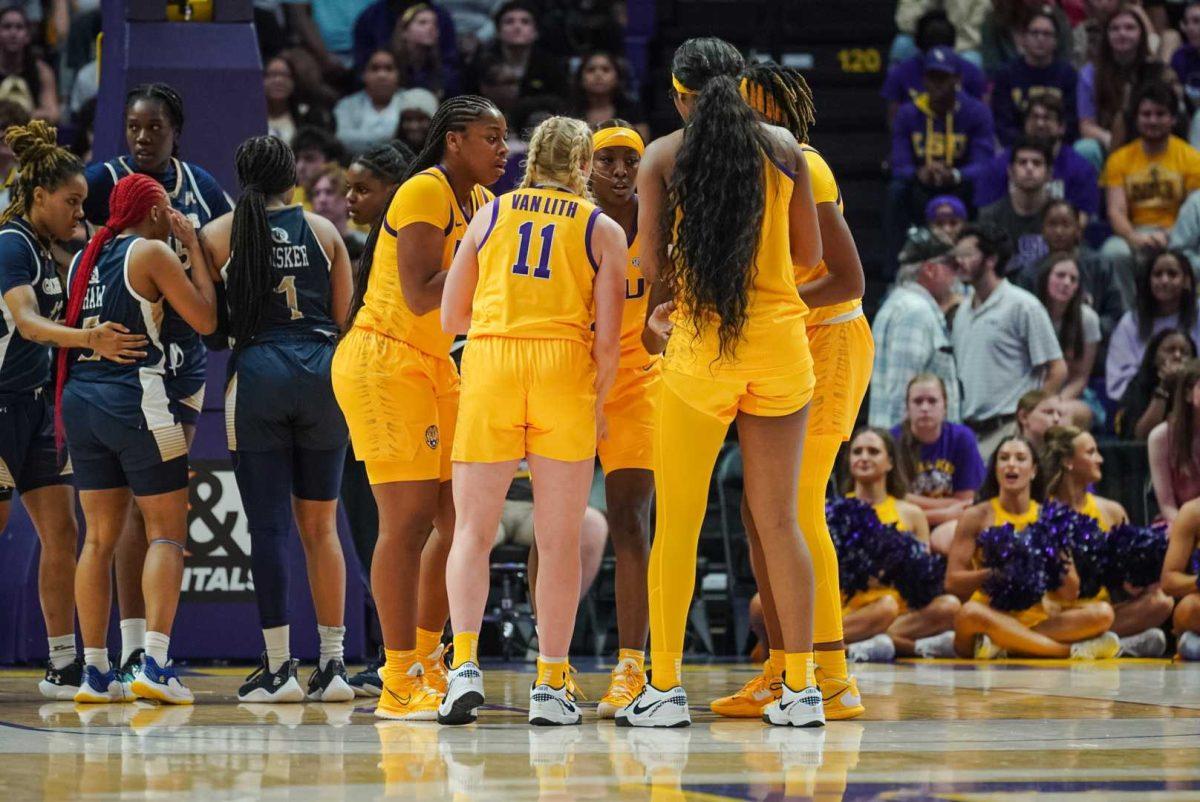 The LSU women&#8217;s basketball team huddles up Thursday, Nov. 9, 2023, during LSU&#8217;s 112-55 win over Queens in the Pete Maravich Assembly Center in Baton Rouge, La.