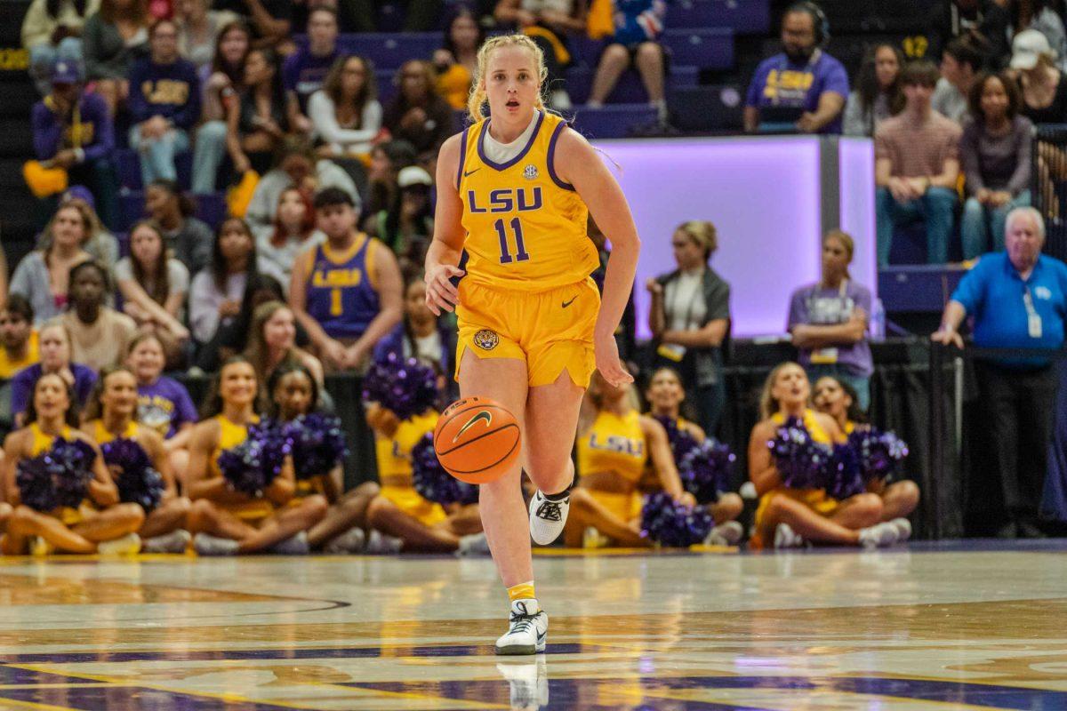 LSU women&#8217;s basketball graduate student guard Hailey Van Lith (11) dribbles the ball Thursday, Nov. 9, 2023, during LSU&#8217;s 112-55 win over Queens in the Pete Maravich Assembly Center in Baton Rouge, La.