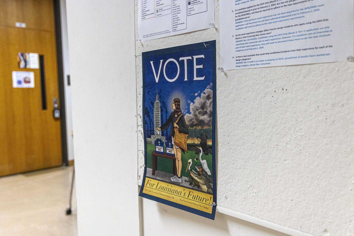 A "VOTE" poster urges students to go vote in the governor's primary Tuesday, Oct. 10, 2023, on the fourth floor of Julian T. White Hall on LSU's campus.