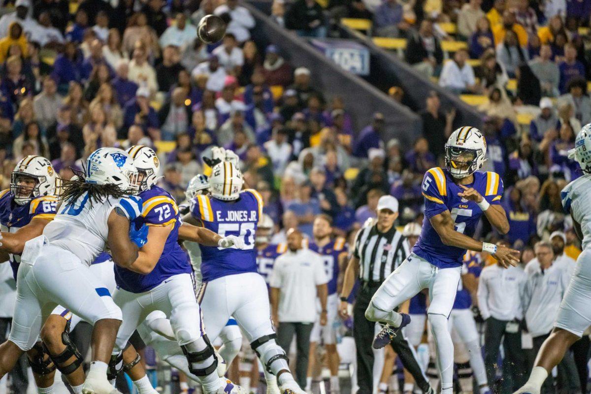 LSU football senior quarterback Jayden Daniels (5) throws the ball Saturday, Nov. 18, 2023, during LSU's 56-14 win against Georgia State in Tiger Stadium in Baton Rouge, La.