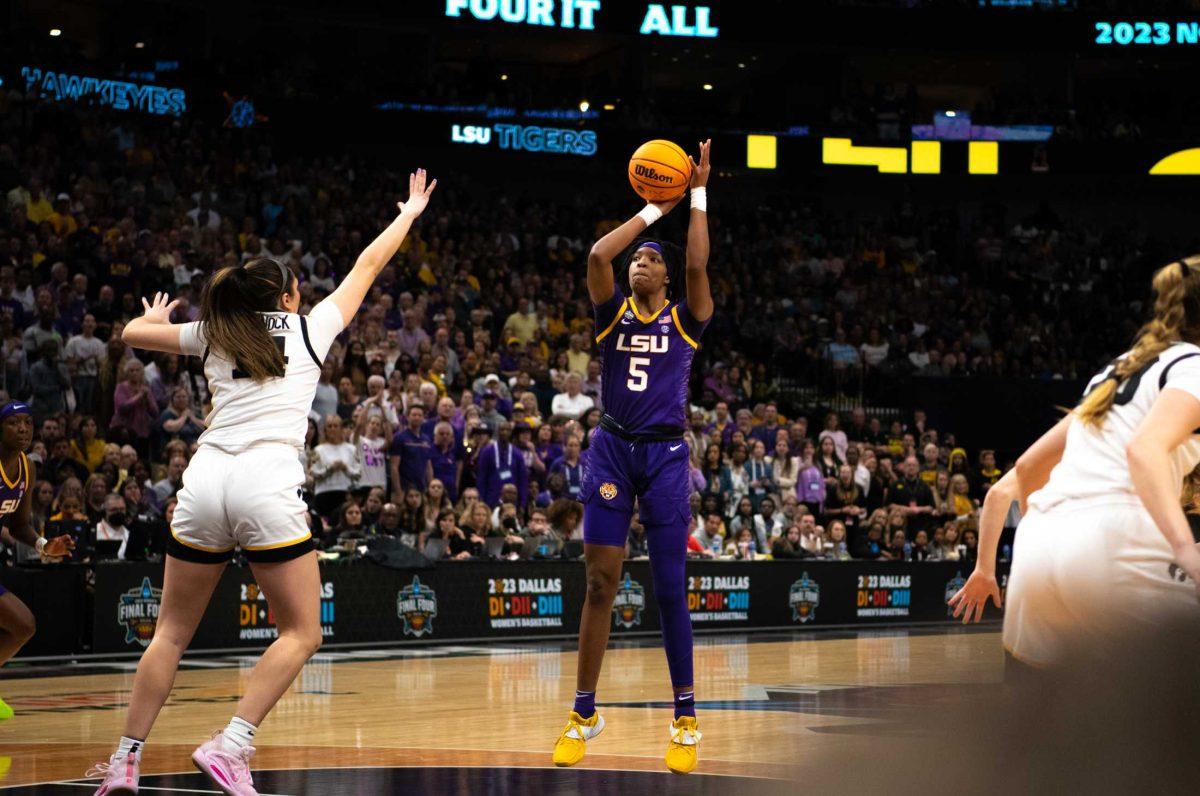 LSU women's basketball freshman forward Sa'Myah Smith (5) attempts the shot on Sunday, April 2, 2023, during LSU's 102-85 win victory against Iowa in the NCAA National Championship in the American Airlines Center in Dallas, Texas.