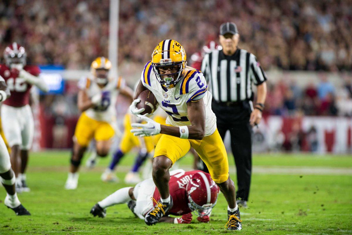 LSU football senior wide receiver Kyren Lacy (2) runs the ball and makes a touchdown on Saturday, Nov. 5, 2023, during LSU's 42-28 loss against Bama in Bryant-Denny stadium in Tuscaloosa, Al.