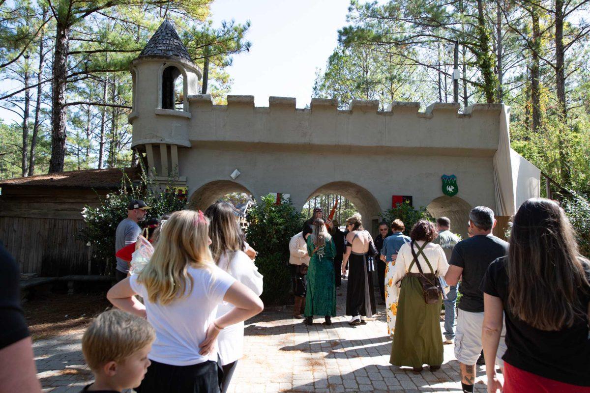 Attendees stand in line to enter the fairgrounds Sunday, Nov. 5, 2023, at the Louisiana Renaissance Festival in Hammond, La.