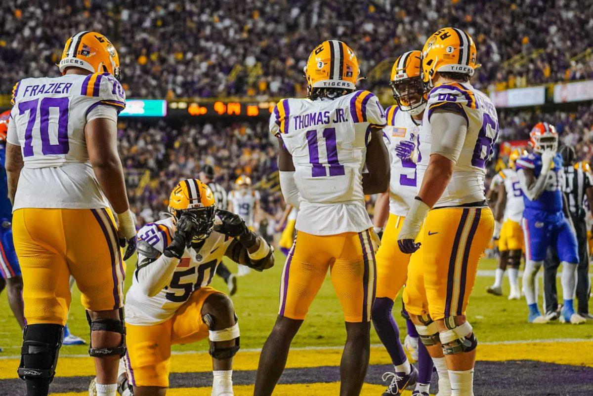 The LSU football team celebrates a touchdown Saturday, Nov. 11, 2023, during LSU&#8217;s 52-35 win against Florida in Tiger Stadium in Baton Rouge, La.