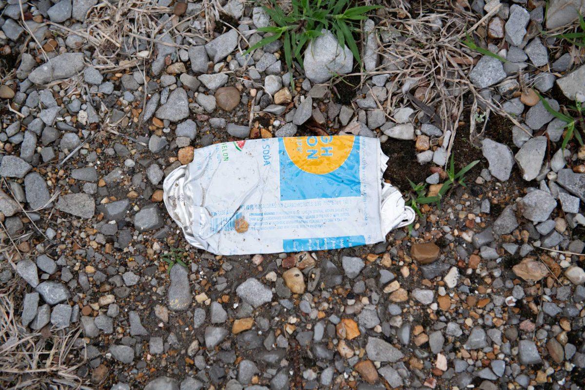 A flattened can of High Noon lays among gravel Thursday, Nov. 16, 2023, on LSU's campus in Baton Rouge, La.