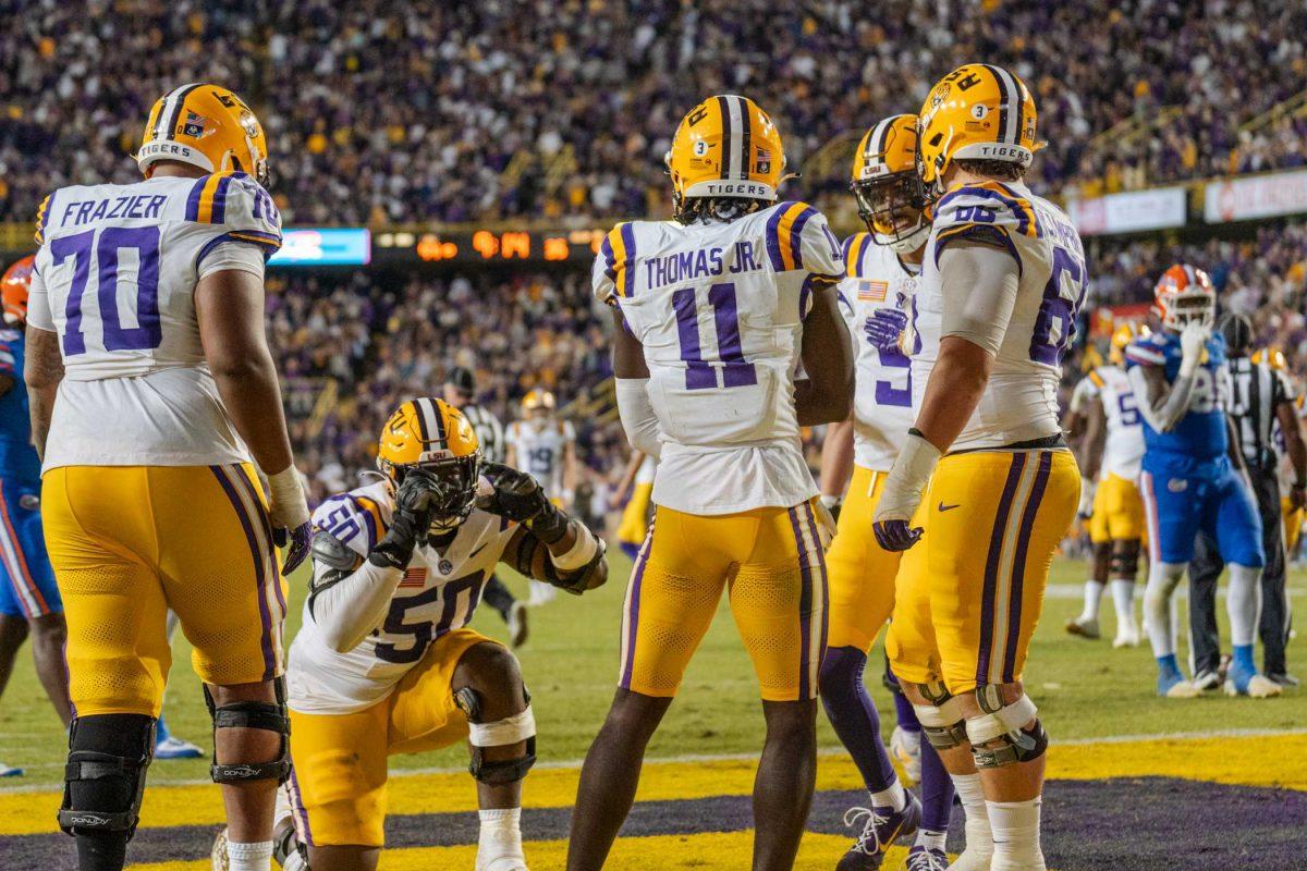 The LSU football team celebrates a touchdown Saturday, Nov. 11, 2023, during LSU&#8217;s 52-35 win against Florida in Tiger Stadium in Baton Rouge, La.