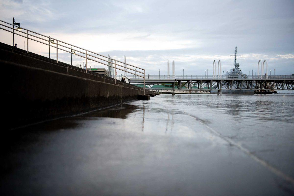 Water flows onto the steps on Tuesday, April 12, 2023, on the Mississippi Riverfront in Baton Rouge, La.