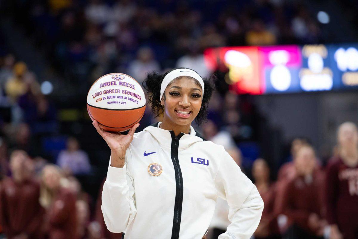 LSU women's basketball junior forward Angel Reese (10) celebrates 1,000 career rebounds Thursday, Nov. 30, 2023, before LSU's 82-64 win against Virginia Tech at the Pete Maravich Assembly Center in Baton Rouge, La.