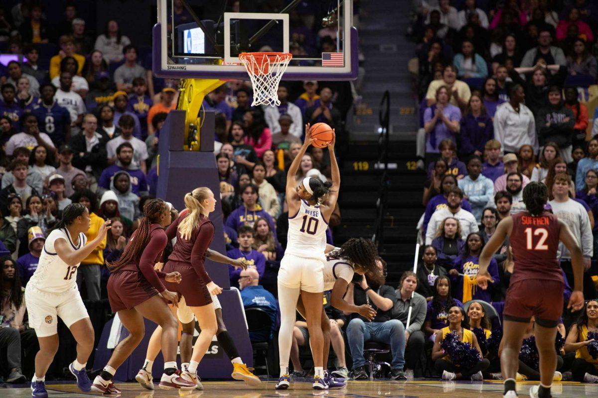 LSU women's basketball junior forward Angel Reese (10) grabs a rebound Thursday, Nov. 30, 2023, during LSU's 82-64 win against Virginia Tech at the Pete Maravich Assembly Center in Baton Rouge, La.