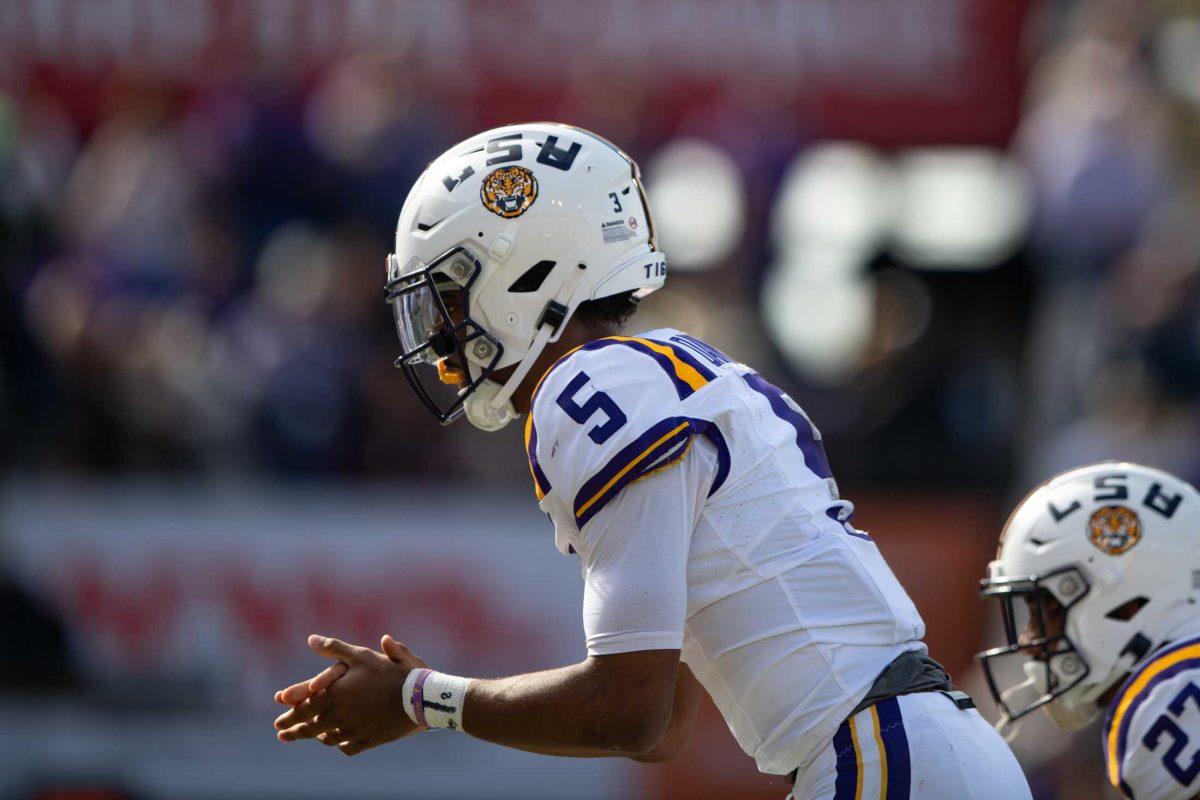 LSU football senior quarterback Jayden Daniels (5) waits for the ball Saturday, Nov. 25, 2023, during LSU's 42-30 win against Texas A&amp;M at Tiger Stadium in Baton Rouge, La.