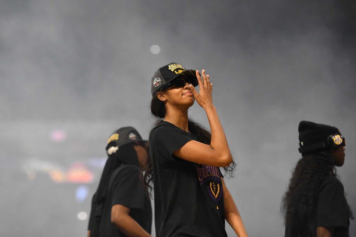 LSU women&#8217;s basketball sophomore forward Angel Reese (10) waves her hand in front of her face at the National Champions welcome celebration on Monday, April 3, 2023, at the Pete Maravich Assembly Center in Baton Rouge, La.