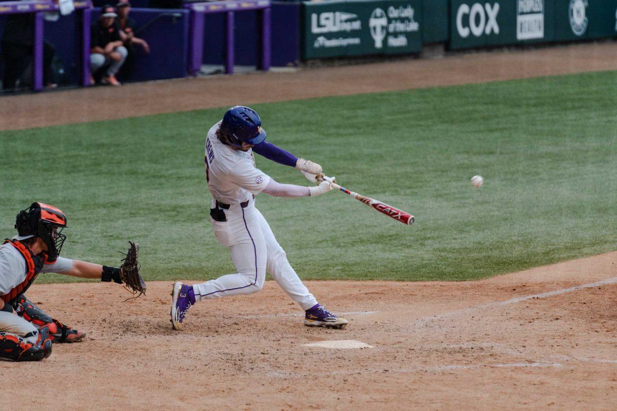 LSU baseball junior outfielder Dylan Crews (3) connects with the ball Sunday, June 4, 2023, during LSU&#8217;s 6-5 win against Oregon State at Alex Box Stadium in Baton Rouge, La.