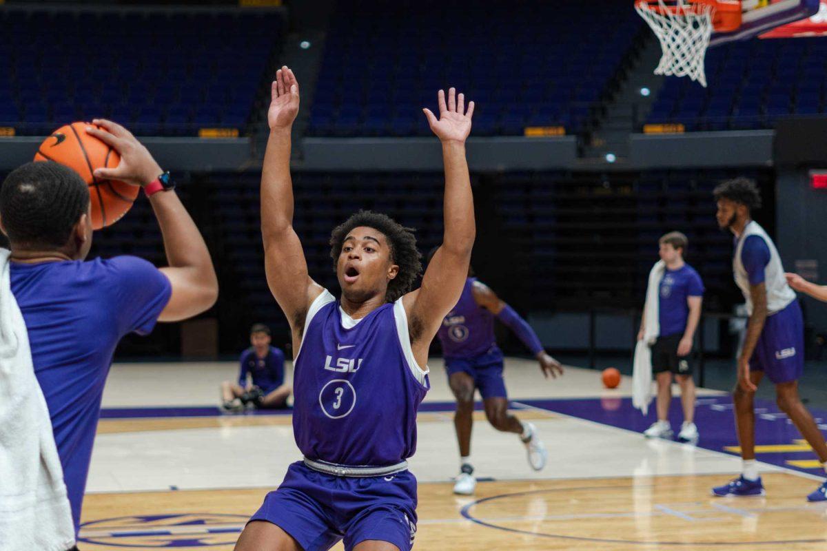 LSU men's basketball junior guard Jalen Cook (3) puts his hands up on Tuesday, Sept. 26, 2023, during the team's first practice at the Pete Maravich Assembly Center in Baton Rouge, La.