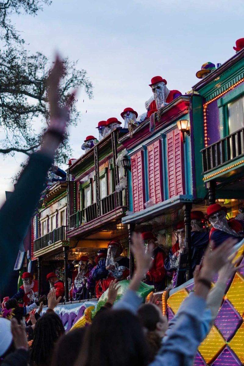 Parade goers yell and put their hands up on Saturday, Feb. 18, 2023, during the Endymion parade in New Orleans, La.