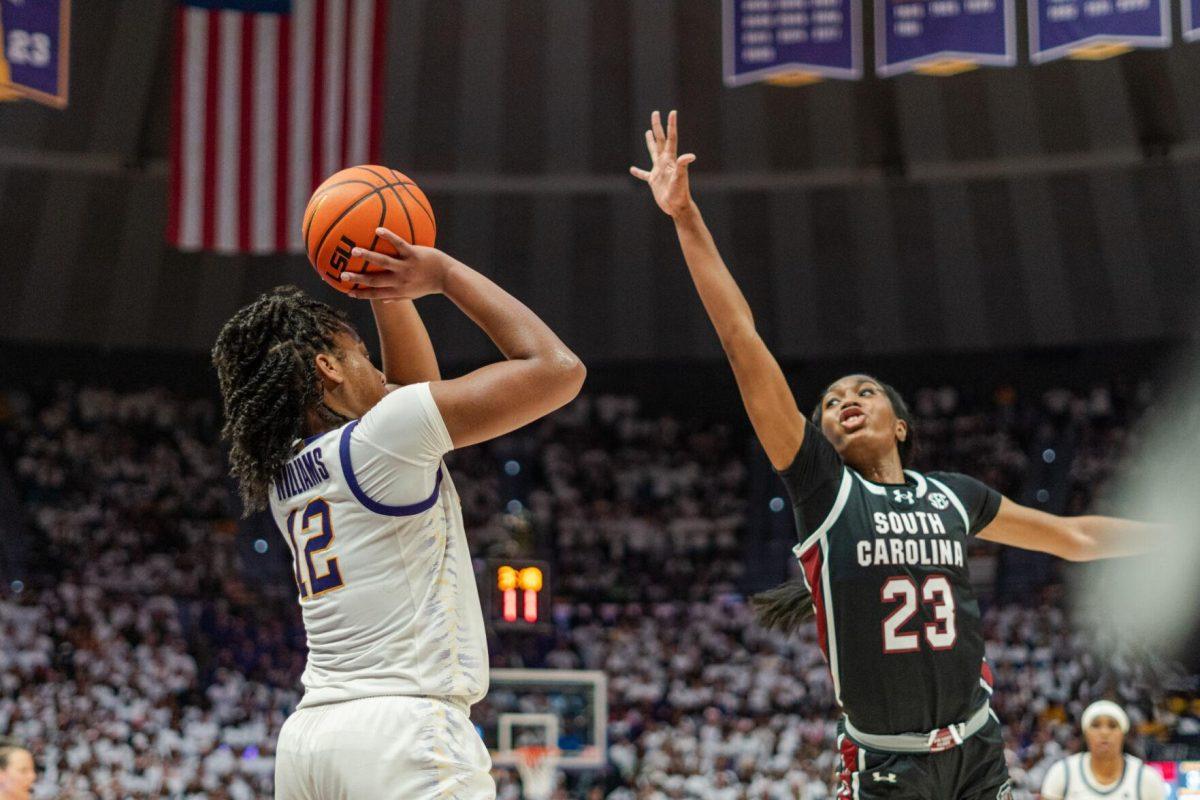 LSU women’s basketball freshman guard Mikaylah Williams (12) shoots the ball Thursday, Jan. 25, 2024, during LSU’s 76-70 loss against South Carolina in the Pete Maravich Assembly Center in Baton Rouge, La.