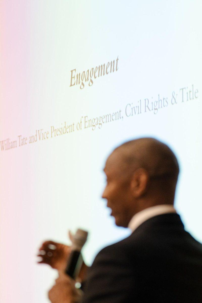 The word "Engagement" appears on the screen as LSU President William F. Tate IV discusses the change of wording from "inclusion" to "engagement" in the Division of Engagement, Civil Rights and Title IX Wednesday, Jan. 24, 2024, at a Faculty Senate meeting inside the Woods Auditorium on LSU's campus in Baton Rouge, La.