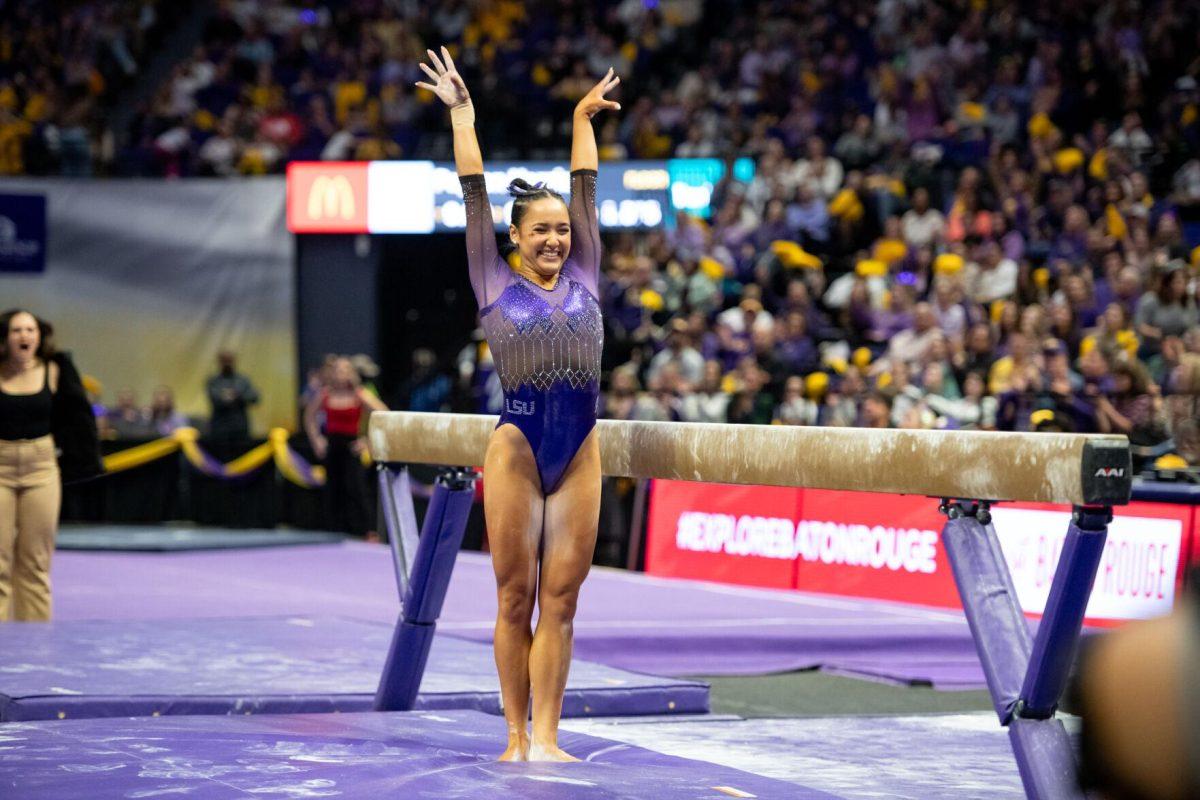 LSU gymnastics all-around junior Aleah Finnegan lands her balance beam routine Friday, Jan. 5, 2024, during LSU&#8217;s 196.975-196.775 victory over Ohio State in the Pete Maravich Assembly Center in Baton Rouge, La.