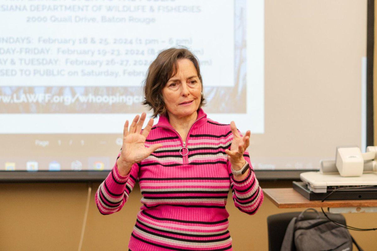 Margo Brault discusses whooping crane conservation and an art contest revolving around the birds Tuesday, Jan. 30, 2024, inside the LSU Journalism Building in Baton Rouge, La.