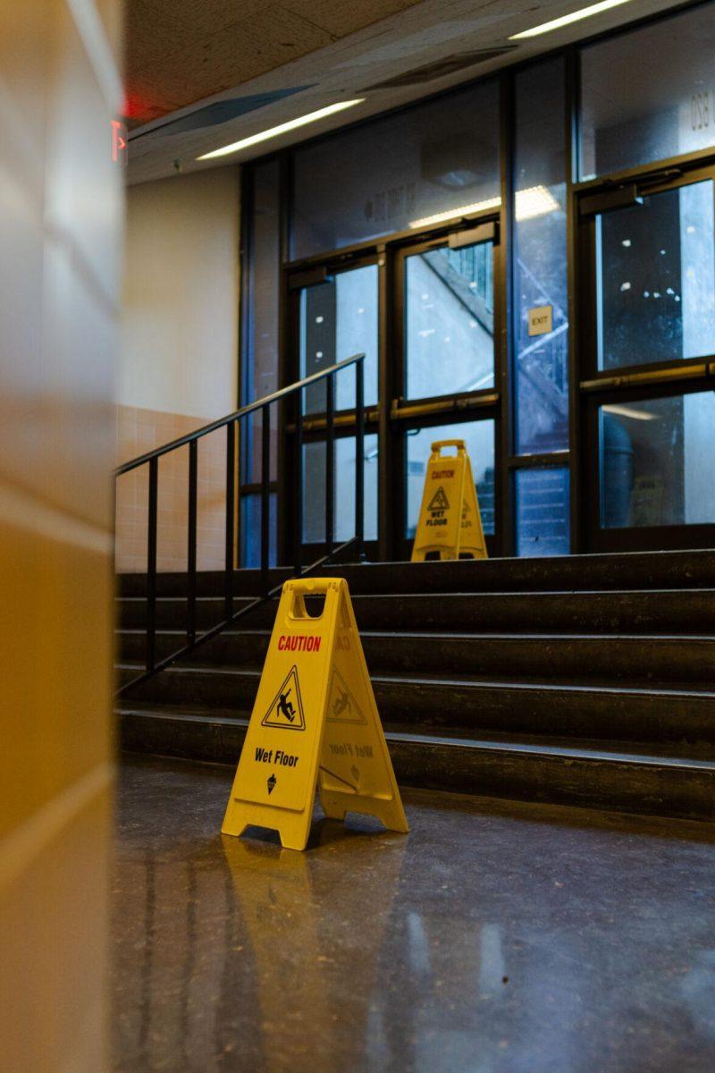 Wet floor signs sit inside Lockett Hall Sunday, Jan. 28, 2024, on LSU's campus in Baton Rouge, La.