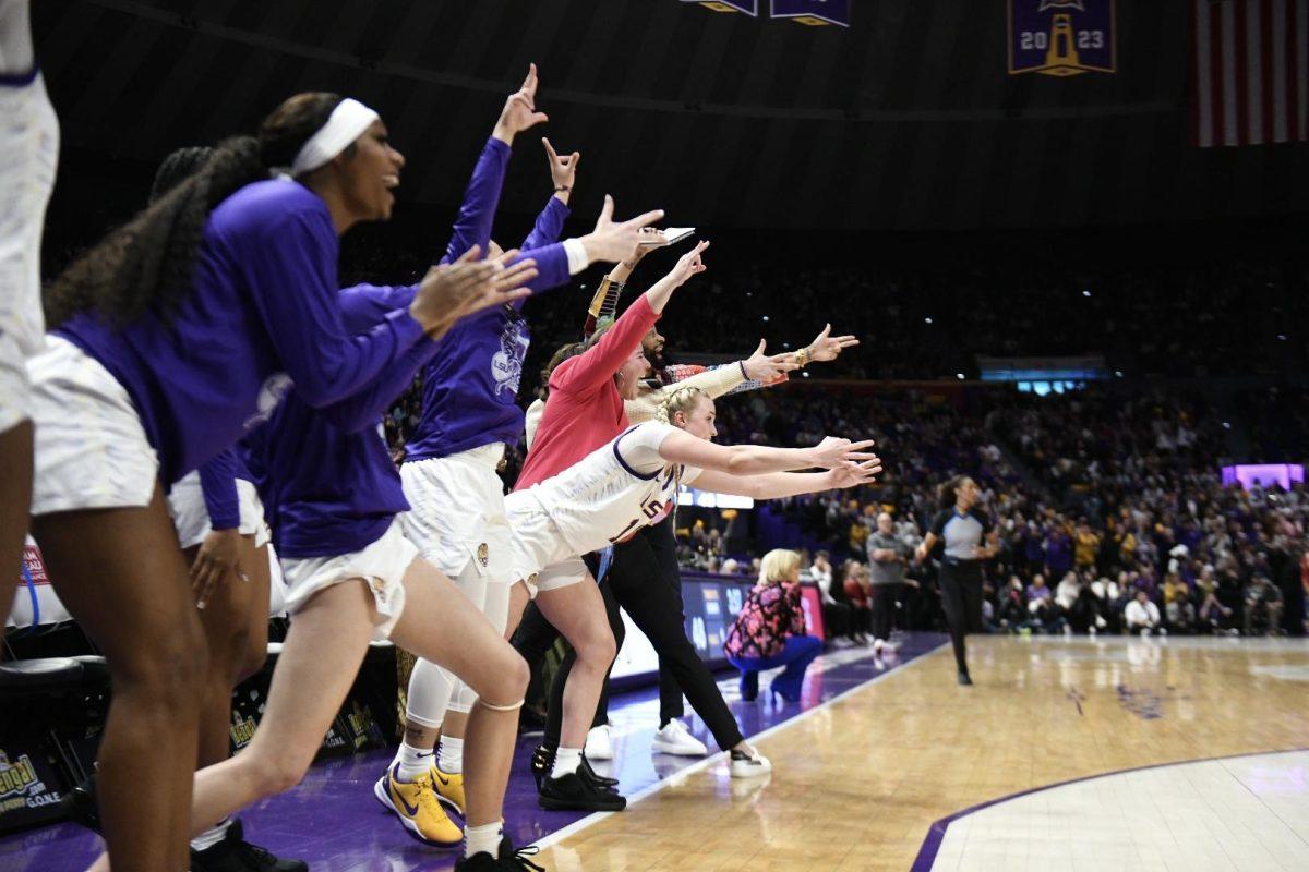 The LSU women&#8217;s basketball team celebrates a play on Sunday, Jan. 21, 2024, during LSU&#8217;s 99-68 win over Arkansas in the Pete Maravich Assembly Center in Baton Rouge, La.