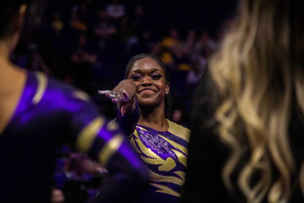 LSU gymnastics senior all-around Kiya Johnson gears up for her floor routine Monday, Dec. 12, 2022, during the annual "Gym 101" showcase in the Pete Maravich Assembly Center.