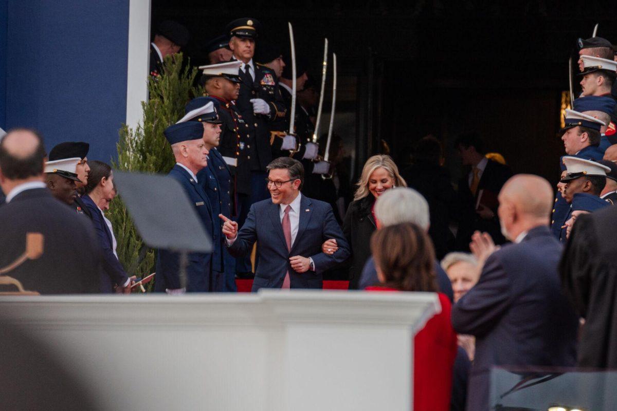 Speaker of the House Mike Johnson and his wife Kelly walk down the State Capitol steps Sunday, Jan. 7, 2024, during the inauguration ceremony in Baton Rouge, La.