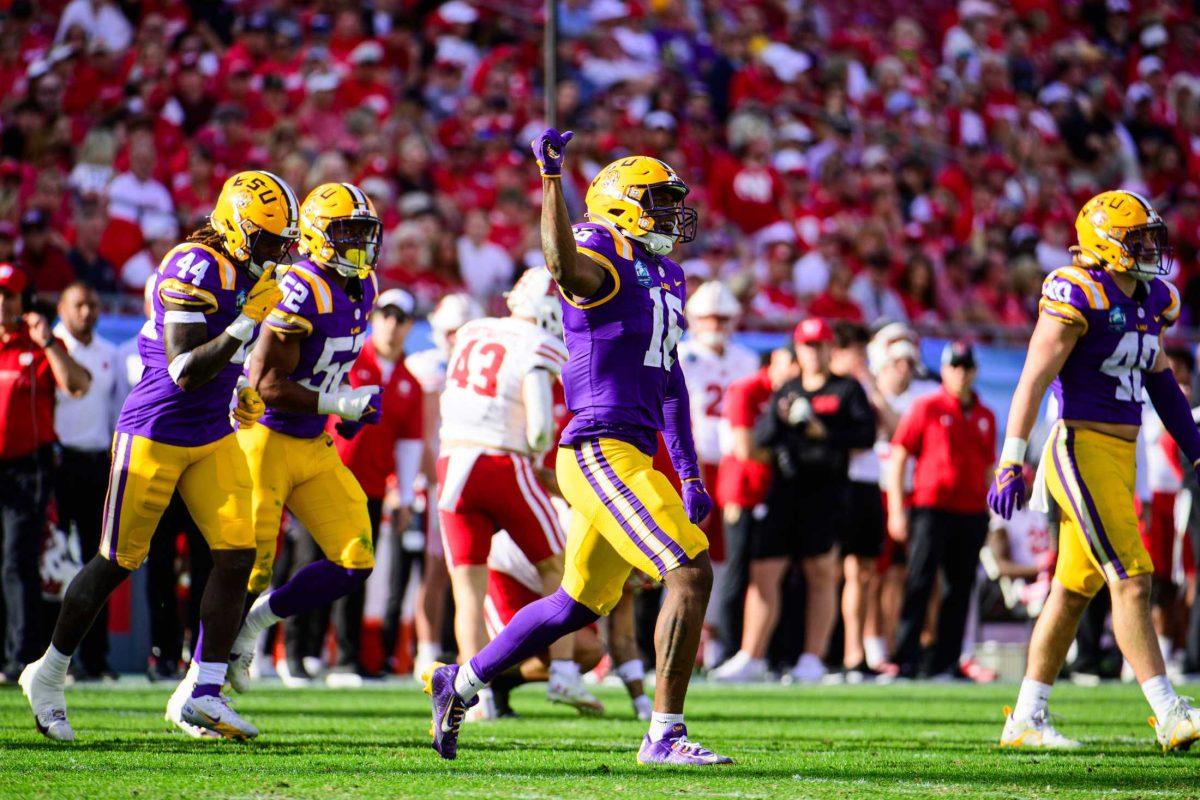 LSU football freshman defensive end Da'Shawn Womack (16) celebrates a defensive stop on Monday, Jan. 1, 2024, during LSU's 35-31 victory against Wisconsin in Raymond James Stadium in Tampa, Fl.